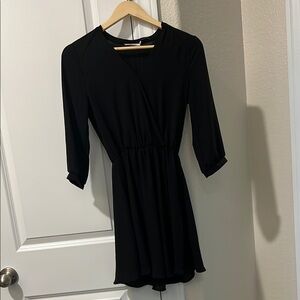 Lush Black Mini Dress with Wrap Style and 3/4 Sleeves